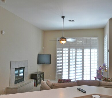Fireplace and exit out to back patio