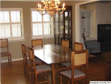 Large dining room with beautiful hardwoods