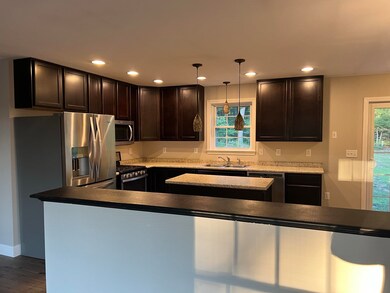 131 Charles Bancroft Hwy, Litchfield, NH 03052 - photo 2