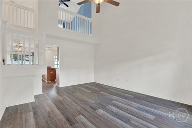 LIVING ROOM WITH NEW LVP FLOORING
