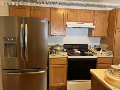 Kitchen with new stainless fridge