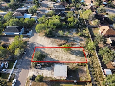 Aerial perspective of suburban area with property parcel outlined