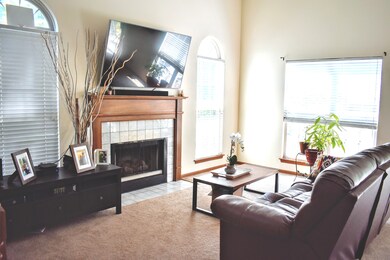 Fireplace and 65 in TV