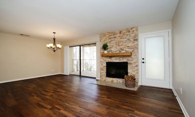 The living room is anchored by a handsomely remode