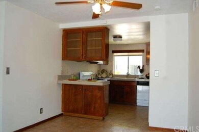 View of Kitchen from dining area. Granite Counter 