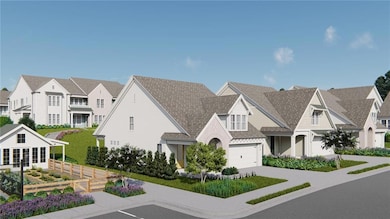 View of front facade with a front lawn and a garag