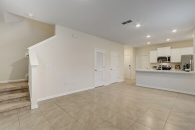 View from front door - note half bath on the left
