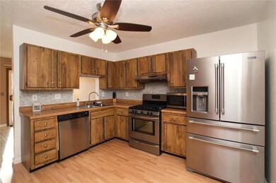 KItchen with an abundance of cabinets and Stainles