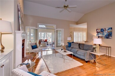 The family room has gorgeous hardwood floors.