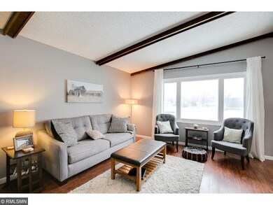 Cozy living room on the upper level.