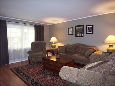 Light & Bright Living room with large window.
