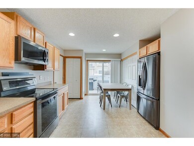 Spacious kitchen with new stainless steel applianc