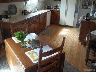 Kitchen. G-L-E-A-M-I-N-G floors, updated cabinets.