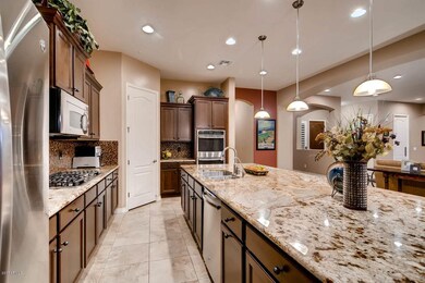 12718 W Forest Pleasant Pl-large-010-22-