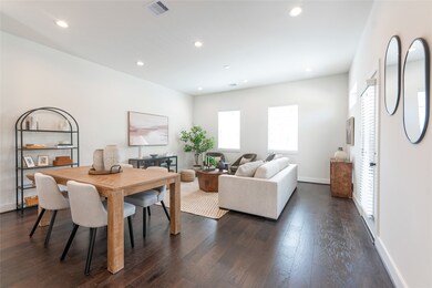 Elegant open-concept dining and living area with m