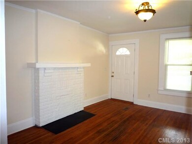 Living Room - Updated light fixtures and refinishe