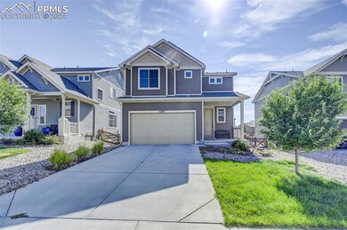 Craftsman house featuring a garage