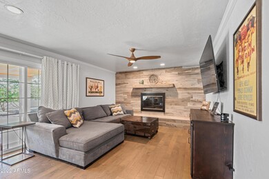 Family room with wood burning FP