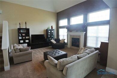 Phenomenal wall of windows and gas burning fireplace!