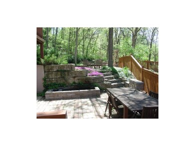Large covered patio off recroom with Koi pond and 