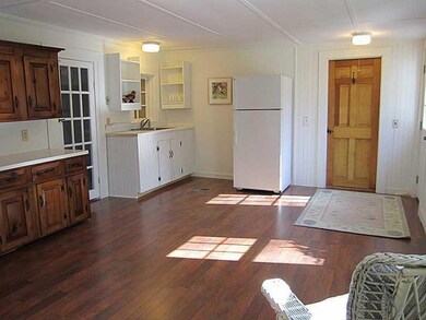 Kitchen. Kitchen opens to an...
