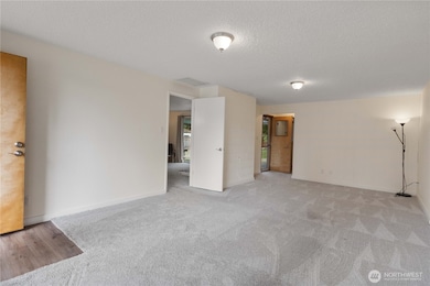 Easy access to your kitchen and livingroom.  Go thru the furthest door for access to the covered patio AND your shop/storage.