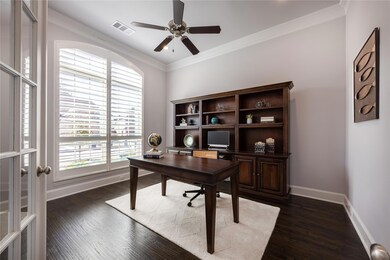 Plantation shutters on front exterior windows and 