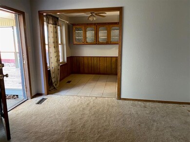 living room view into dining area
