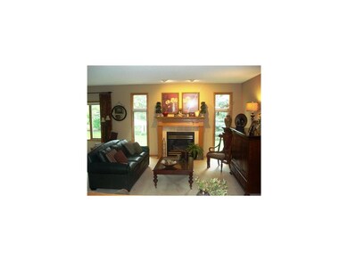 Living Room. THE OPEN LIVING ROOM GREETS YOU FROM 
