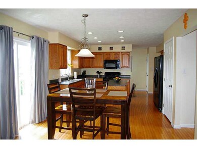 Kitchen. Entry way and kitchen feature hard wood f