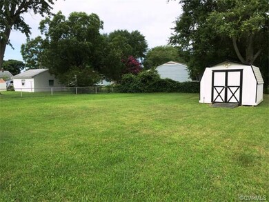 Huge fenced-in backyard with shed