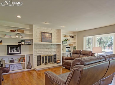 Wood burning fireplace and built-in bookcase