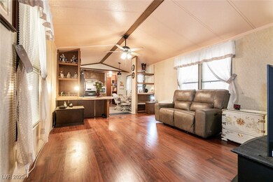 Living area featuring dark wood finished floors an