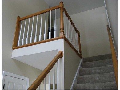 Entry/Foyer. Oak railings to 2nd story