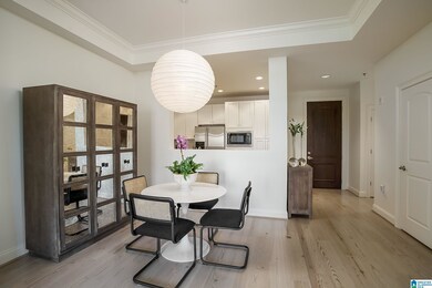 Gleaming real wood floors, door on right is coat c