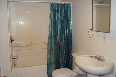 Here is the rather spacious bath with a new tile f