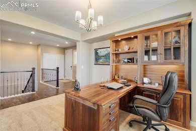 The open living area allows space for a main level office.