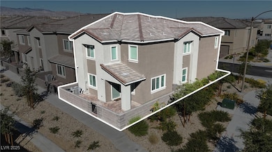 Rear view of property featuring a residential view, stucco siding, and a tiled roof
