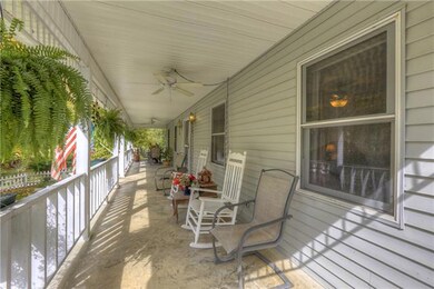 Imagine sitting out and enjoying the surrounding nature from your front porch!