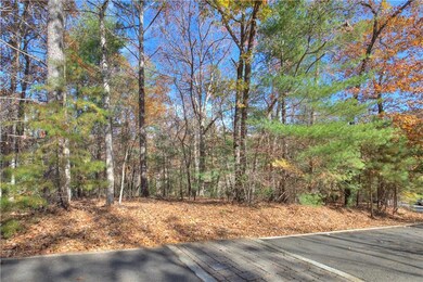View of yard with a forest view