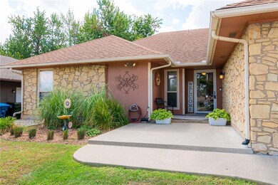Front exterior - lovely garden, lots of patio space!