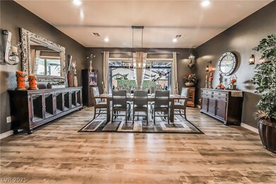 DINING ROOM WITH ADJOINING OUTDOOR LIVING AREA.