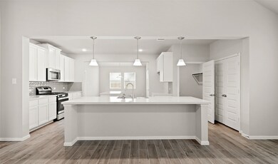 Gourmet kitchen with quartz countertops (*Photo no