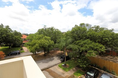 View of beautiful tree-lined Lovett Blvd from your