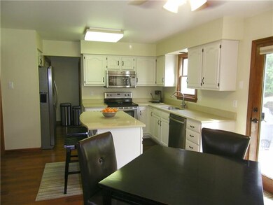 Updated kitchen with stainless steel appliances, q
