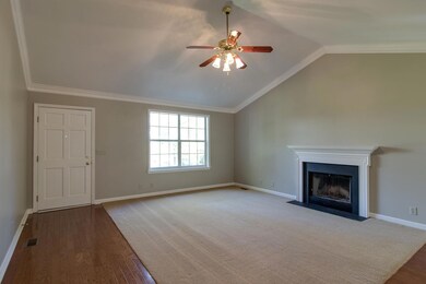 Gracious living room with wood burning fireplace
