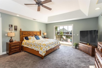 Primary Bedroom with private balcony
