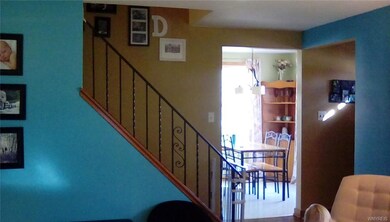 Front entrance and stairs to the master suite