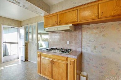 Kitchen, leading to breakfast area and small side 