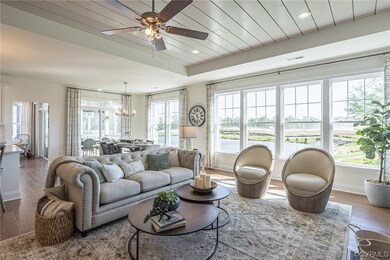 Living room featuring dark hardwood / wood-style f